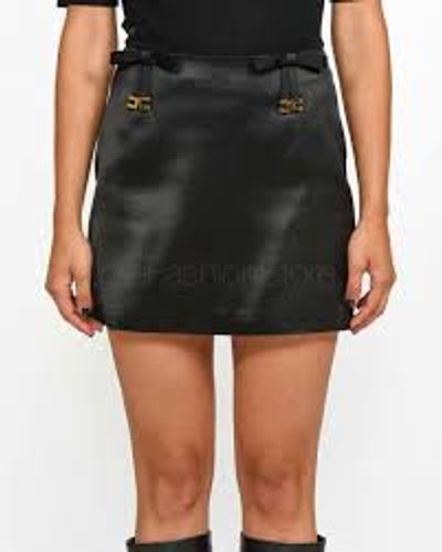 Satin miniskirt with bows‏