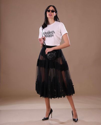 Skirt in tulle fabric with lace decorations