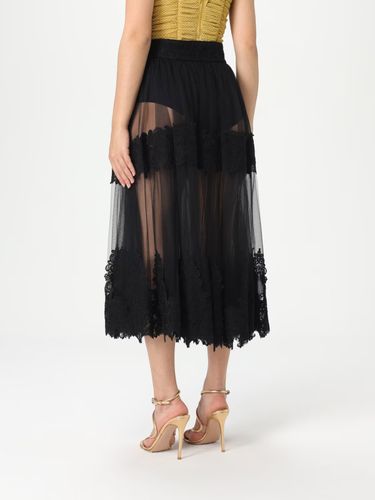 Skirt in tulle fabric with lace decorations