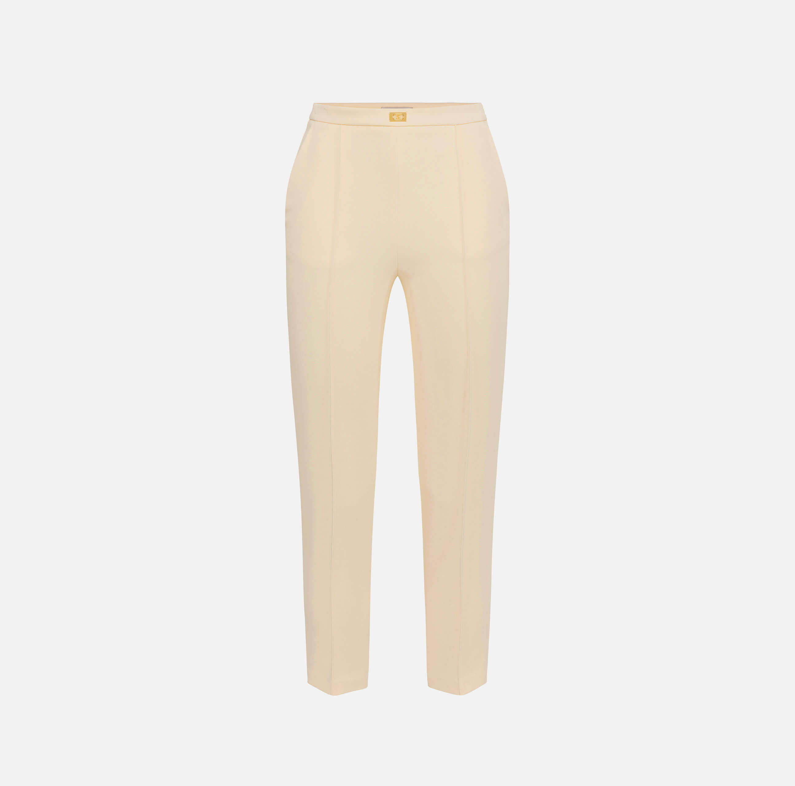 Trousers in crêpe fabric with pockets and logo plaque