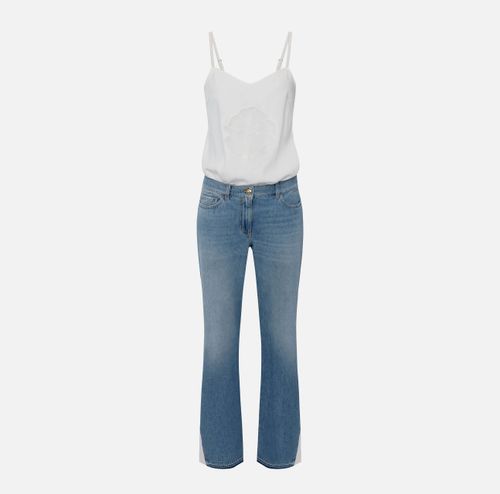 Trompe-l'oeil jumpsuit in crêpe and denim