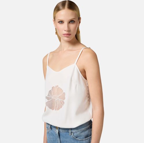 Trompe-l'oeil jumpsuit in crêpe and denim