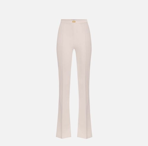 Crêpe bell-bottom trousers with logo plaque