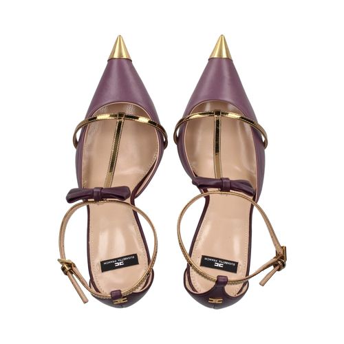 Pumps with knot and metal toe cap