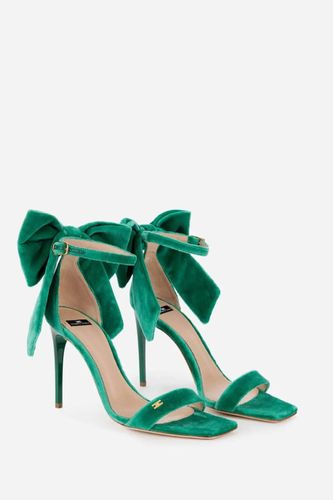 Open-toe sandals with large velvet bow
