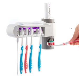 מתקן למברשות שיניים כולל דיספנסר למשחה InnovaGoods