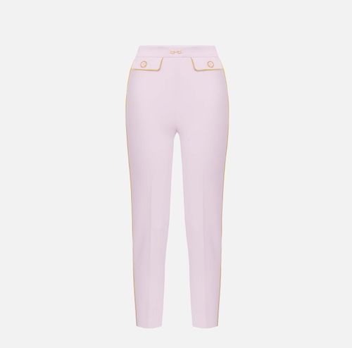 Trousers in crêpe fabric with piping and jewelled horsebit
