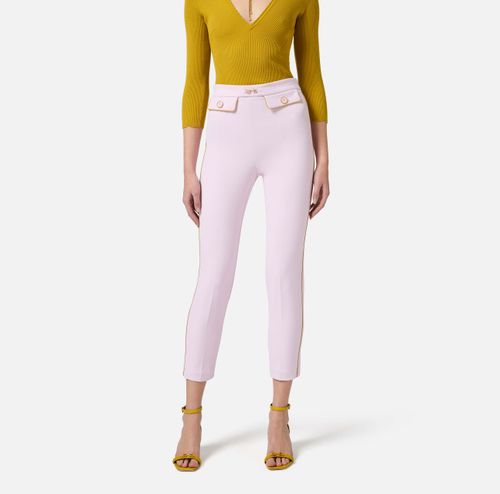 Trousers in crêpe fabric with piping and jewelled horsebit