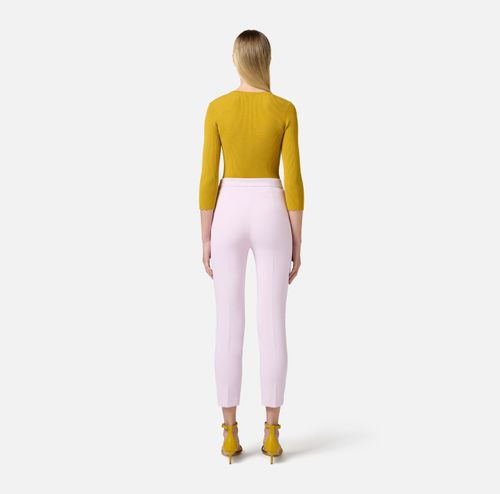 Trousers in crêpe fabric with piping and jewelled horsebit
