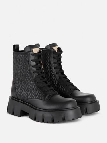 Nappa combat boots with logo plaque