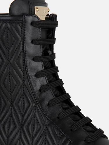 Nappa combat boots with logo plaque