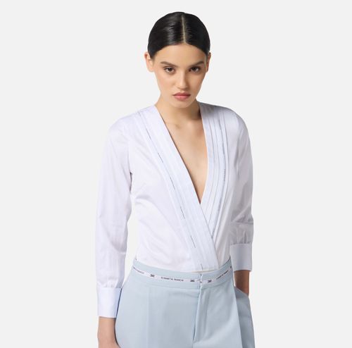 Cotton poplin bodysuit with tuxedo details
