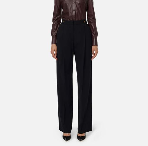 Crêpe trousers with logo details