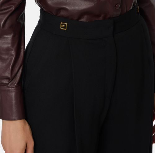Crêpe trousers with logo details