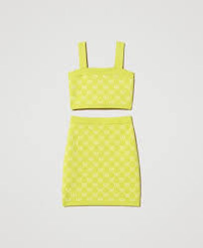 Knit top and skirt with jacquard Oval T