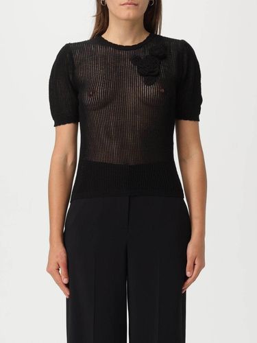 Mesh knit top with crochet flowers