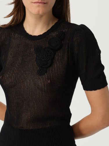 Mesh knit top with crochet flowers
