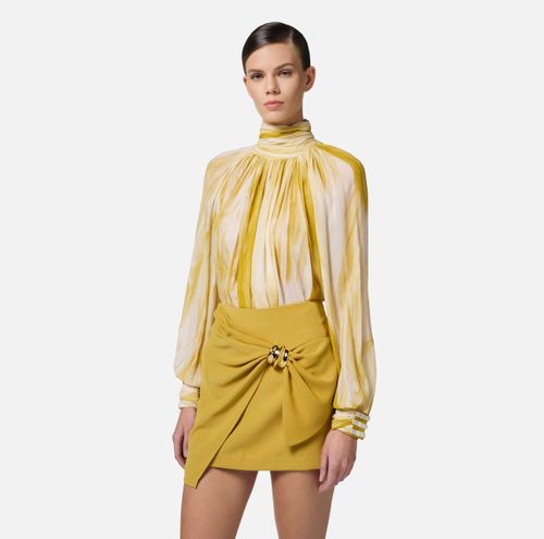 Crepon blouse with tulle print and bows