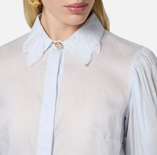 Muslin blouse with flounce sleeves