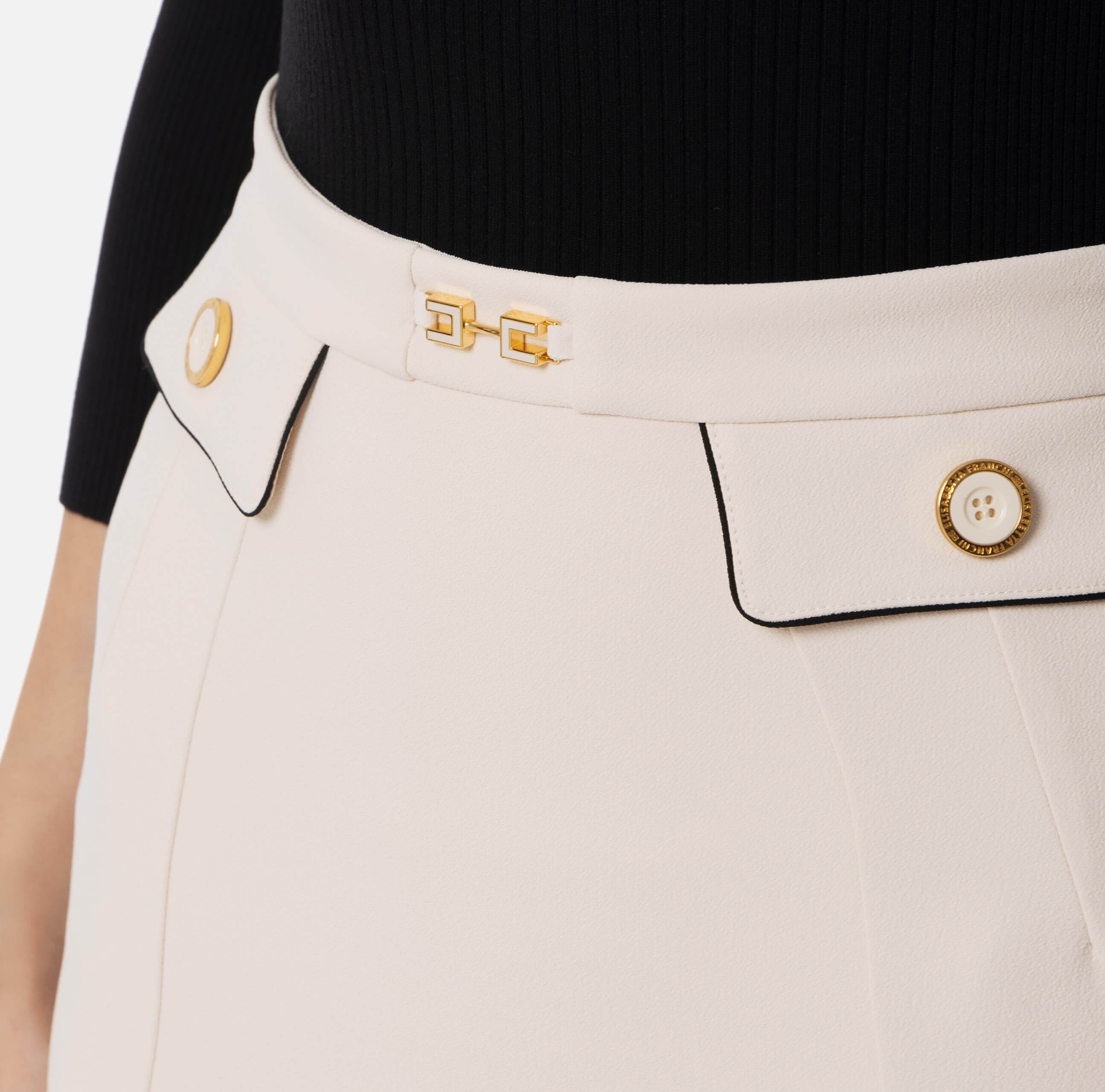 Miniskirt in crêpe fabric with piping and jewelled horsebit