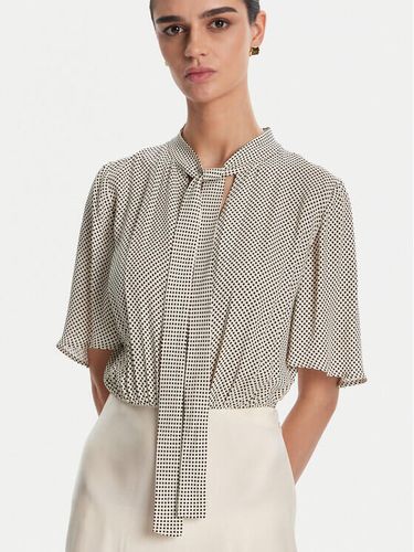 Dress in georgette fabric with polka dot print