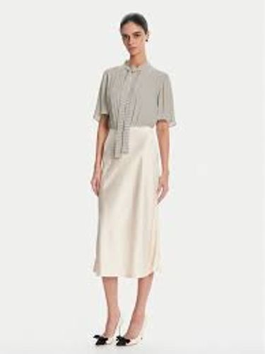 Dress in georgette fabric with polka dot print