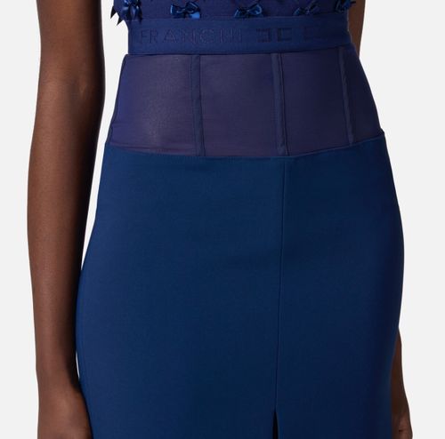 Crêpe skirt with tulle peplum
