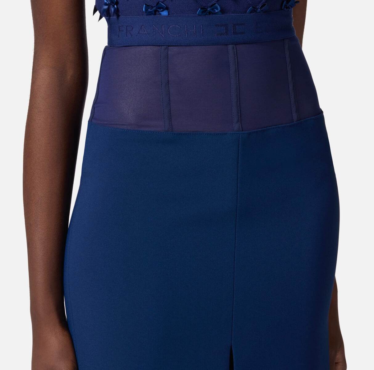 Crêpe skirt with tulle peplum