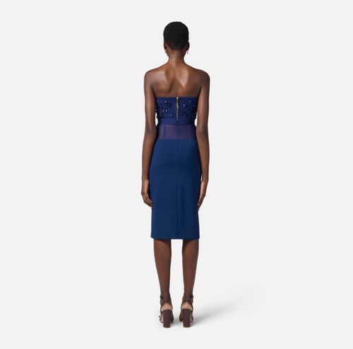 Crêpe skirt with tulle peplum