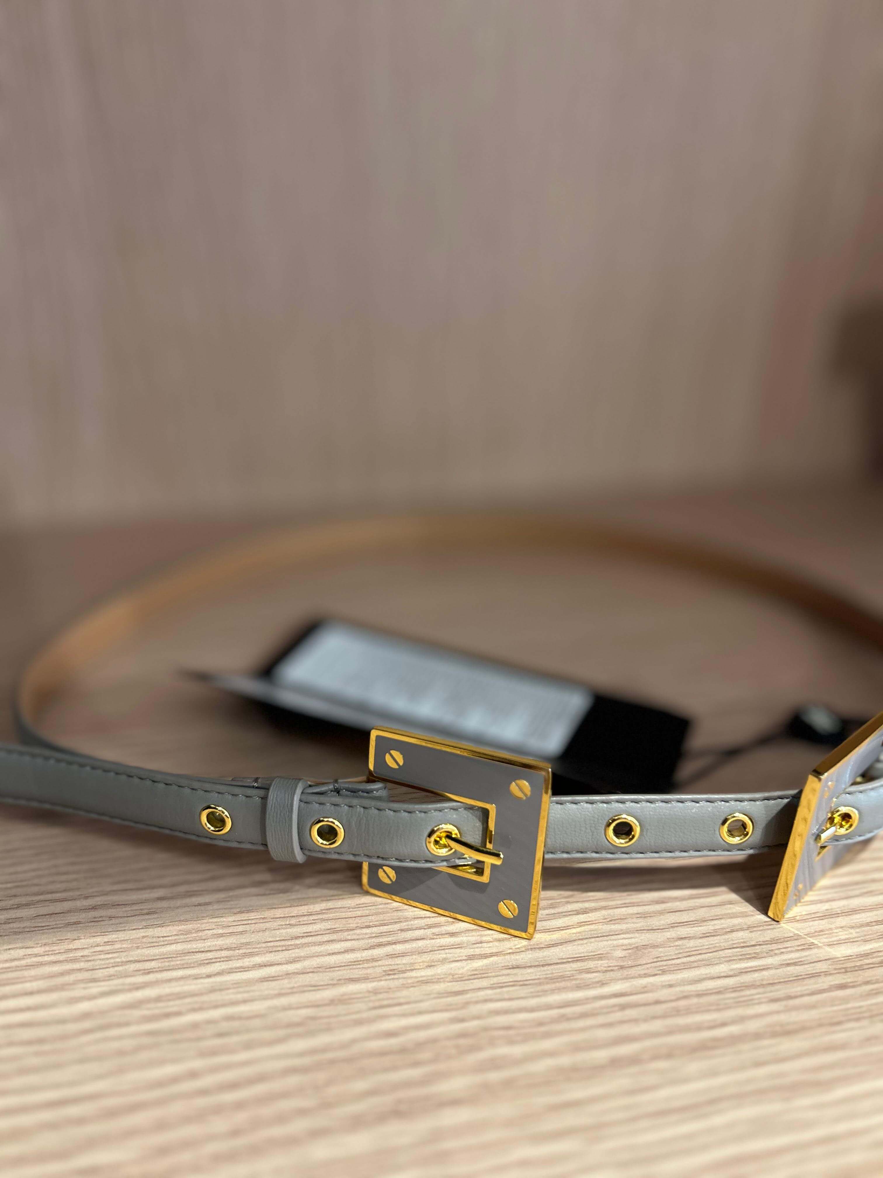 Thin faux leather belt with logo buckle