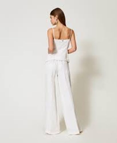 Palazzo trousers in jacquard satin