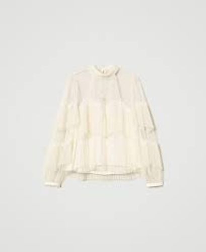 Tulle blouse with pleated flounces