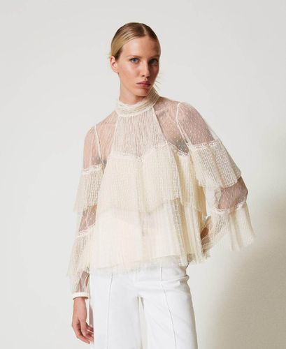 Tulle blouse with pleated flounces