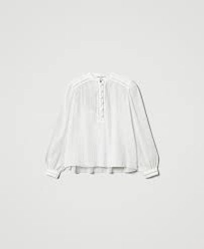 Georgette blouse with pleats and embroidery