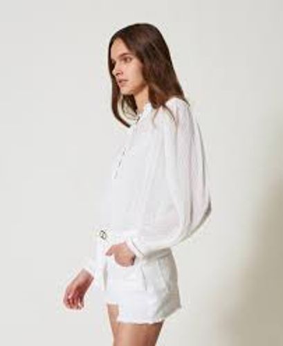 Georgette blouse with pleats and embroidery