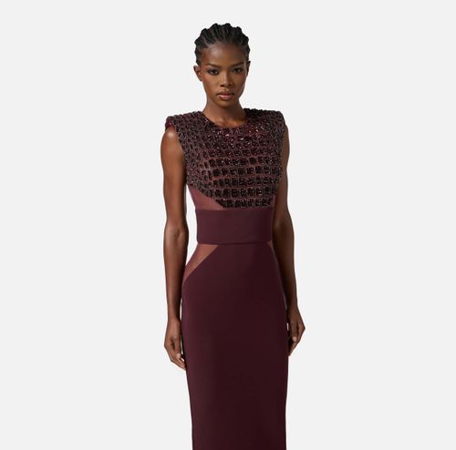 Dress in lightweight crêpe and tulle fabrics with crocodile-effect embroideries