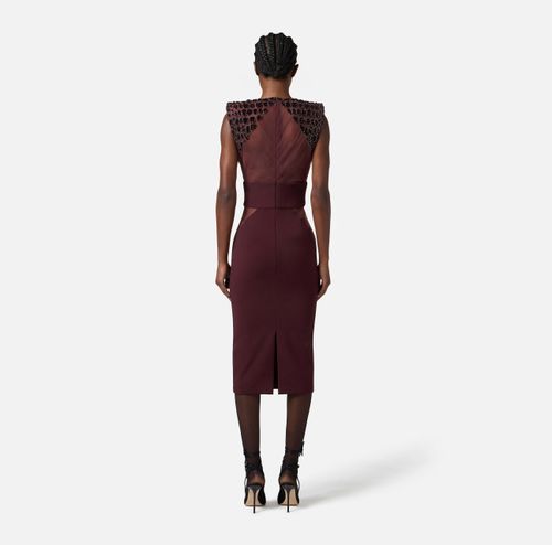 Dress in lightweight crêpe and tulle fabrics with crocodile-effect embroideries