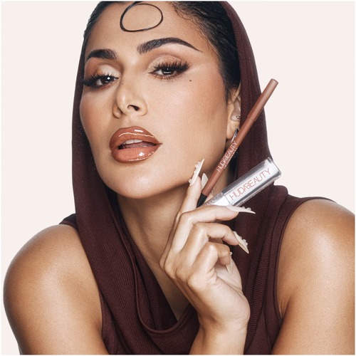 גלוס שפתיים הודא ביוטי בגוון HUDA BEAUTY  Faux Filler Extra Shine Lip Gloss 