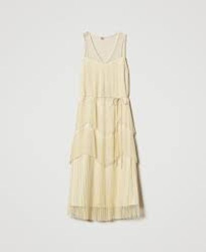 Long tulle dress with pleated flounces
