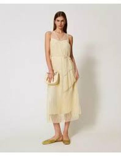 Long tulle dress with pleated flounces