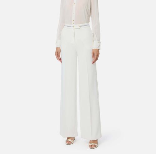 Trousers in lightweight crêpe fabric with logo ribbon