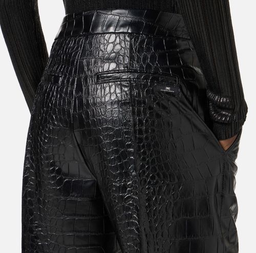 Trousers with crocodile print