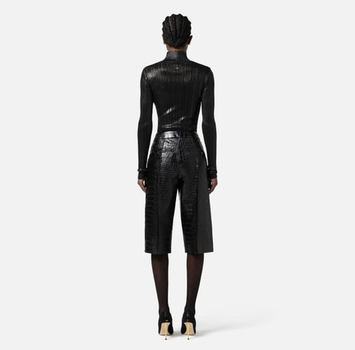 Trousers with crocodile print