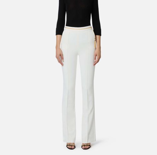 Trousers in lightweight crêpe fabric with jewel chain