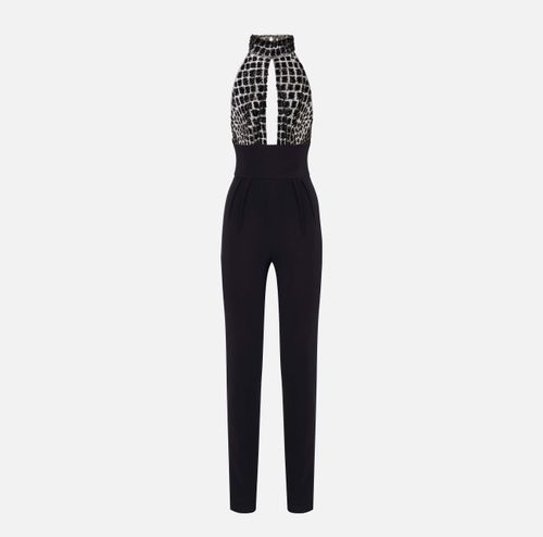 Jumpsuit in tulle and crêpe fabrics with crocodile embroideries