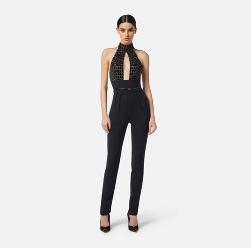 Jumpsuit in tulle and crêpe fabrics with crocodile embroideries