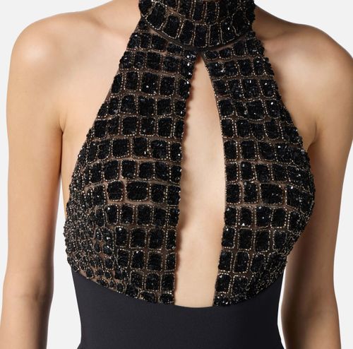 Jumpsuit in tulle and crêpe fabrics with crocodile embroideries