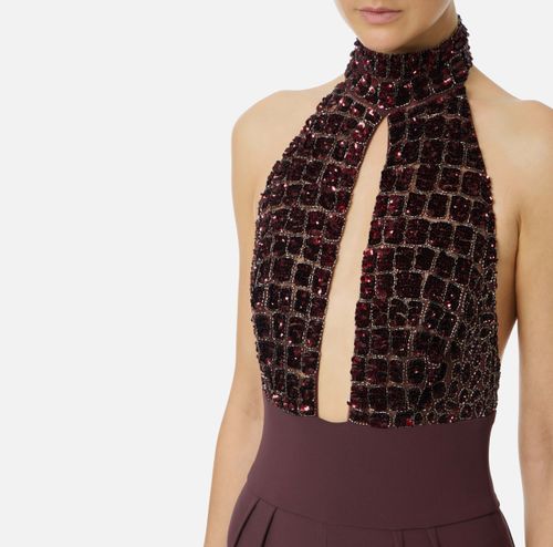 Jumpsuit in tulle and crêpe fabrics with crocodile embroideries