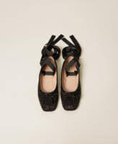 Ballet flats with Oval T embroidery and rhinestones