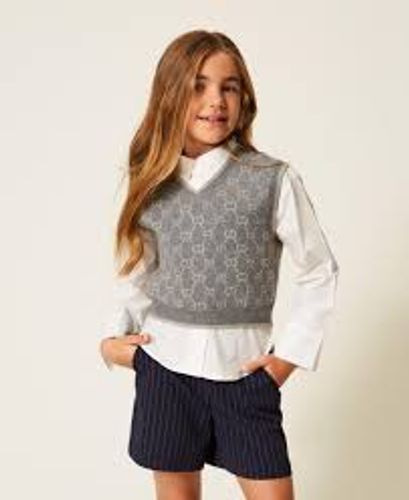 Jacquard knit sleeveless jumper with Oval T